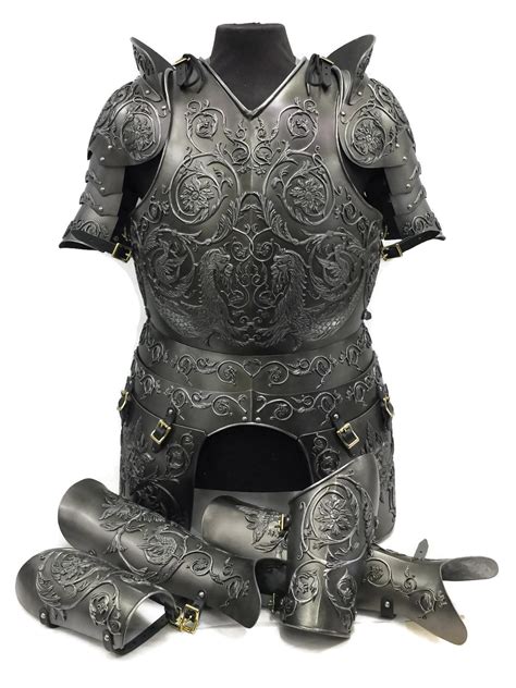 Armour metals - armour metals stock pictures, royalty-free photos & images. Medieval Knight With Banner and Sword Standing Near Burning... A medieval knight from rear view standing hold a sword and tattered flag, and looking behind himself. The warrior knight is wearing a suit of armour and chainmail, and walks on rocky ground close to a burning ruin of a ...